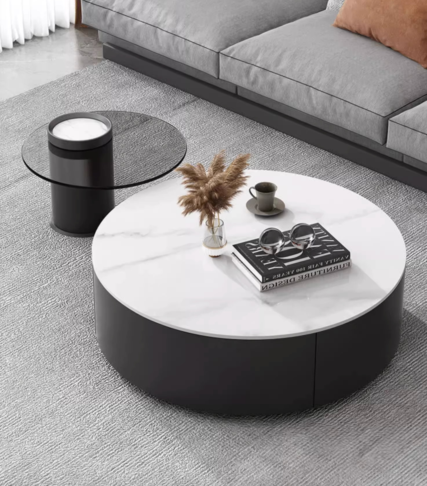 Modern round nesting coffee table with white marble top and black base from mosaic set with ottoman