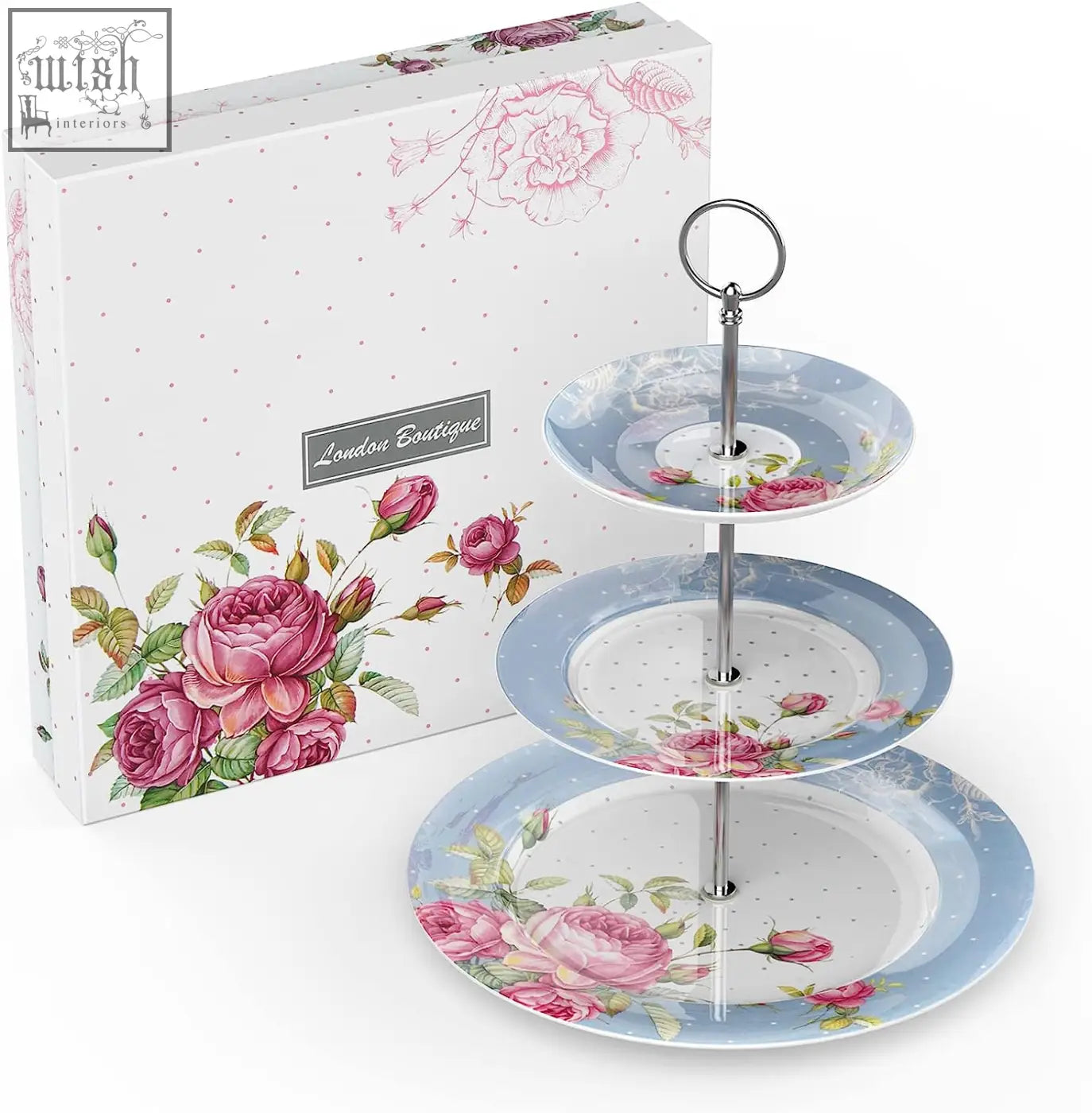 Three tier cake stand with pink rose and green leaf patterns on light blue plates and silver metal column