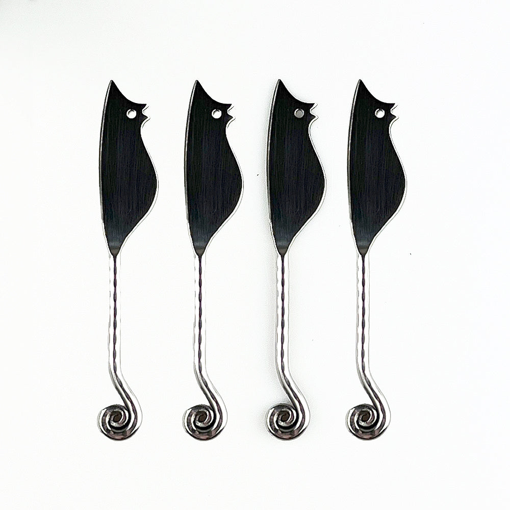 Set of four black mouse mini cheese knives with silver twisted handles and spiral ends for easy cutting