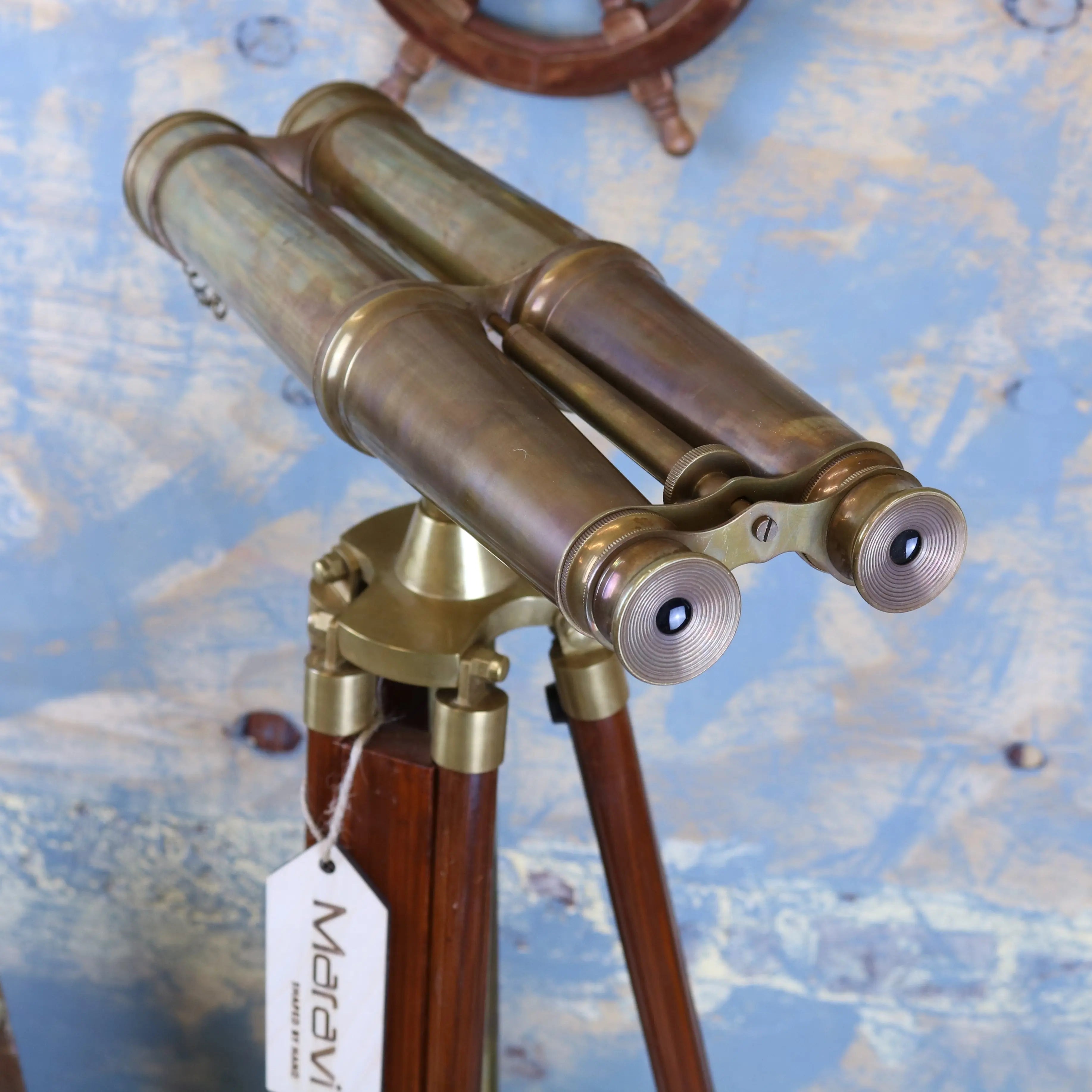 Mowai vintage binoculars made of antique brass mounted on a wooden tripod stand for classic decor and use