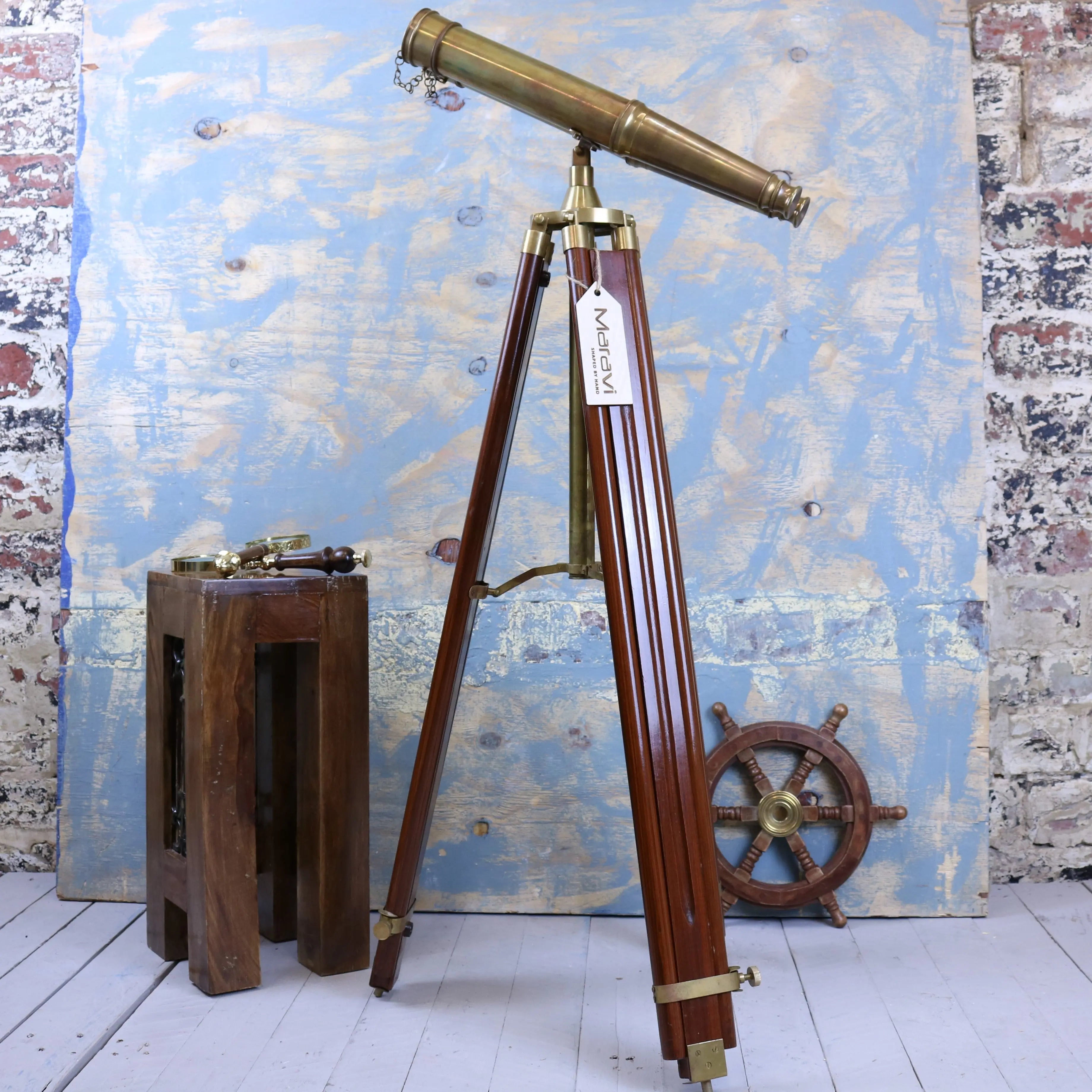 Mowai vintage binoculars feature an antique brass telescope on a polished wooden tripod stand for classic style