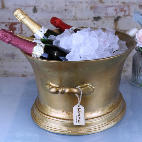 Gold-colored vintage moyar champagne bucket with ornate handles and matavi tag for large ice bath use