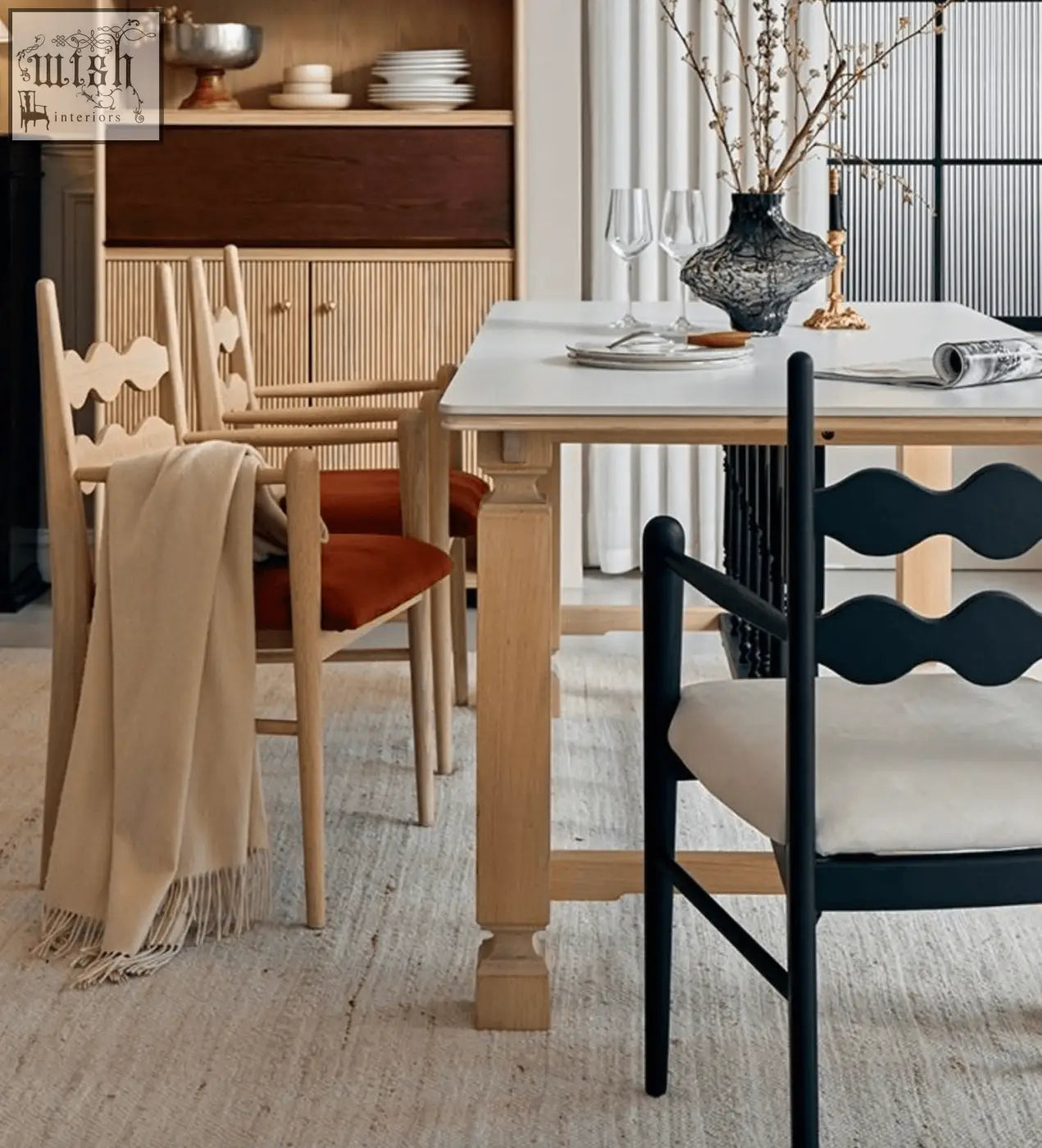 Black lacquered wooden mucha dining chair with cream upholstered seat and wavy backrest design for dining use