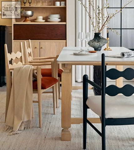Dark blue wavy-back mucha dining chair with cream cushion perfect for stylish dining seating