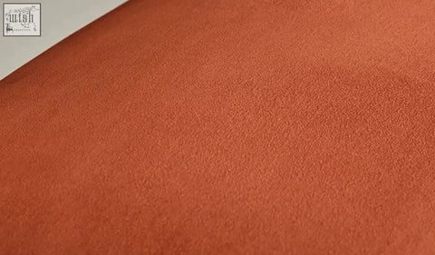 Soft rust-orange suede fabric with velvety texture on mucha dining chair upholstery for stylish dining chair seating