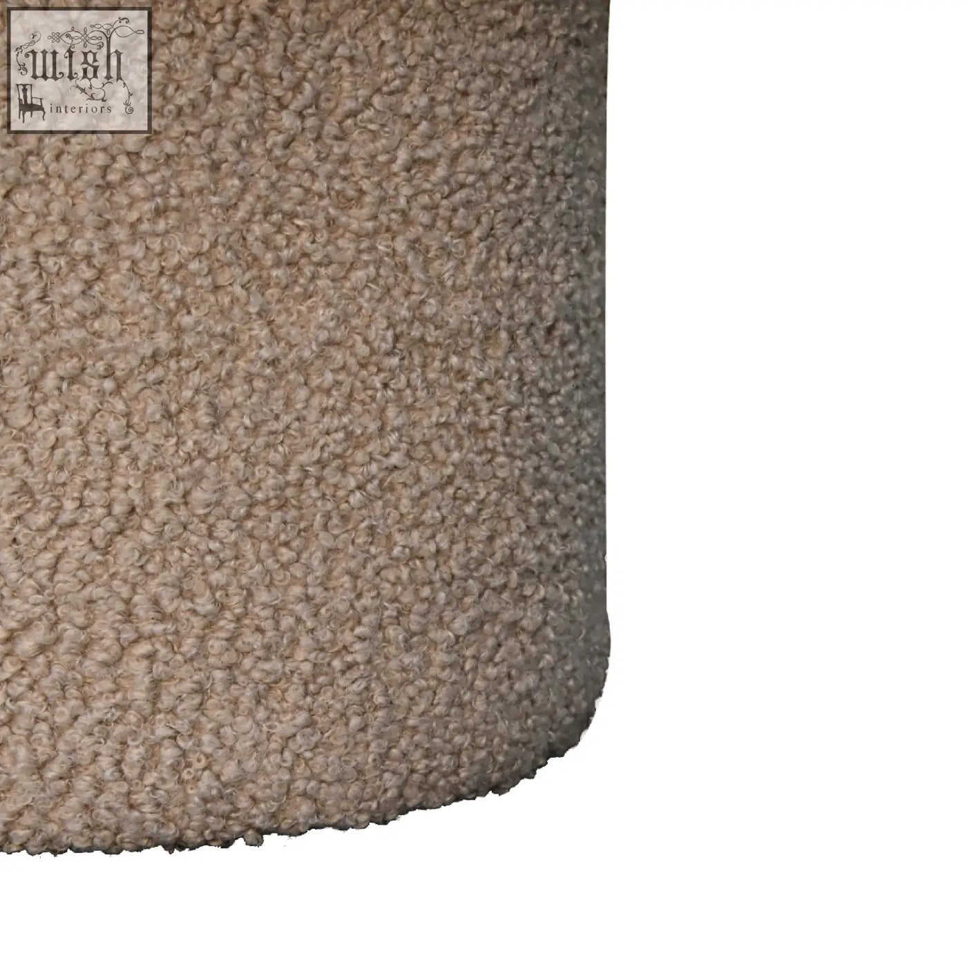 Beige mud boucle fabric with plush curly texture on mud boucle mushroom footstool surface