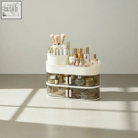 Cream-colored two-tiered dustproof desktop vanity storage organizer with transparent drawers and white handles