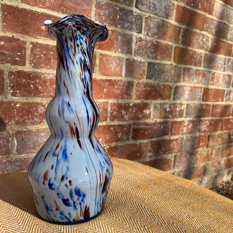 Murano tall glass vase with swirling blue and red patterns on a white double-gourd shaped base
