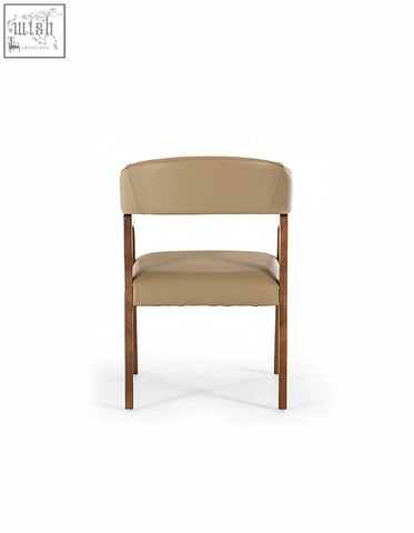 Beige leather murcell matching dining chair with slender wooden legs perfect as a stylish matching dining chair