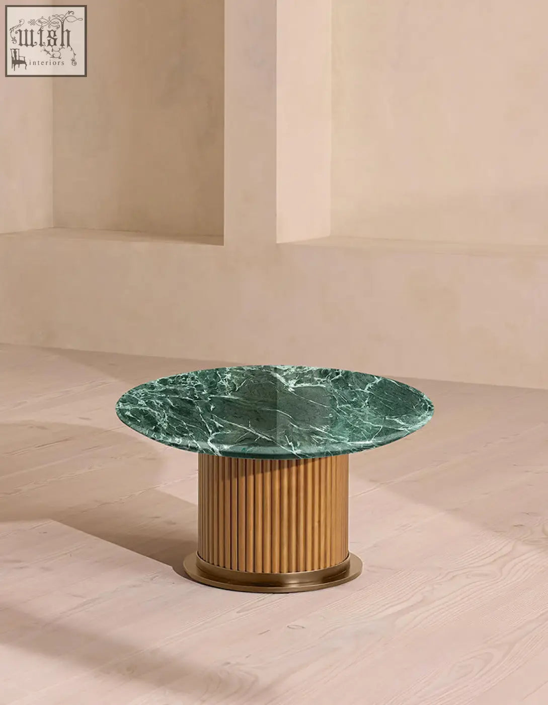 Murcell oval accent coffee table with a vibrant brazilian green marble top and gold-toned fluted base marble coffee table