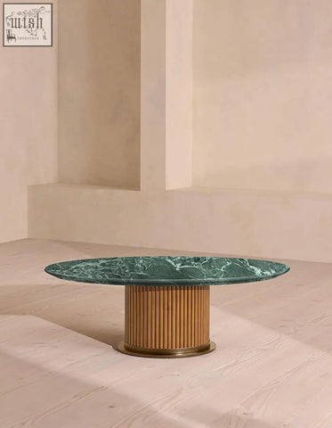 Murcell oval accent coffee table with vibrant brazilian green marble coffee top and light wood slat base with brass accents