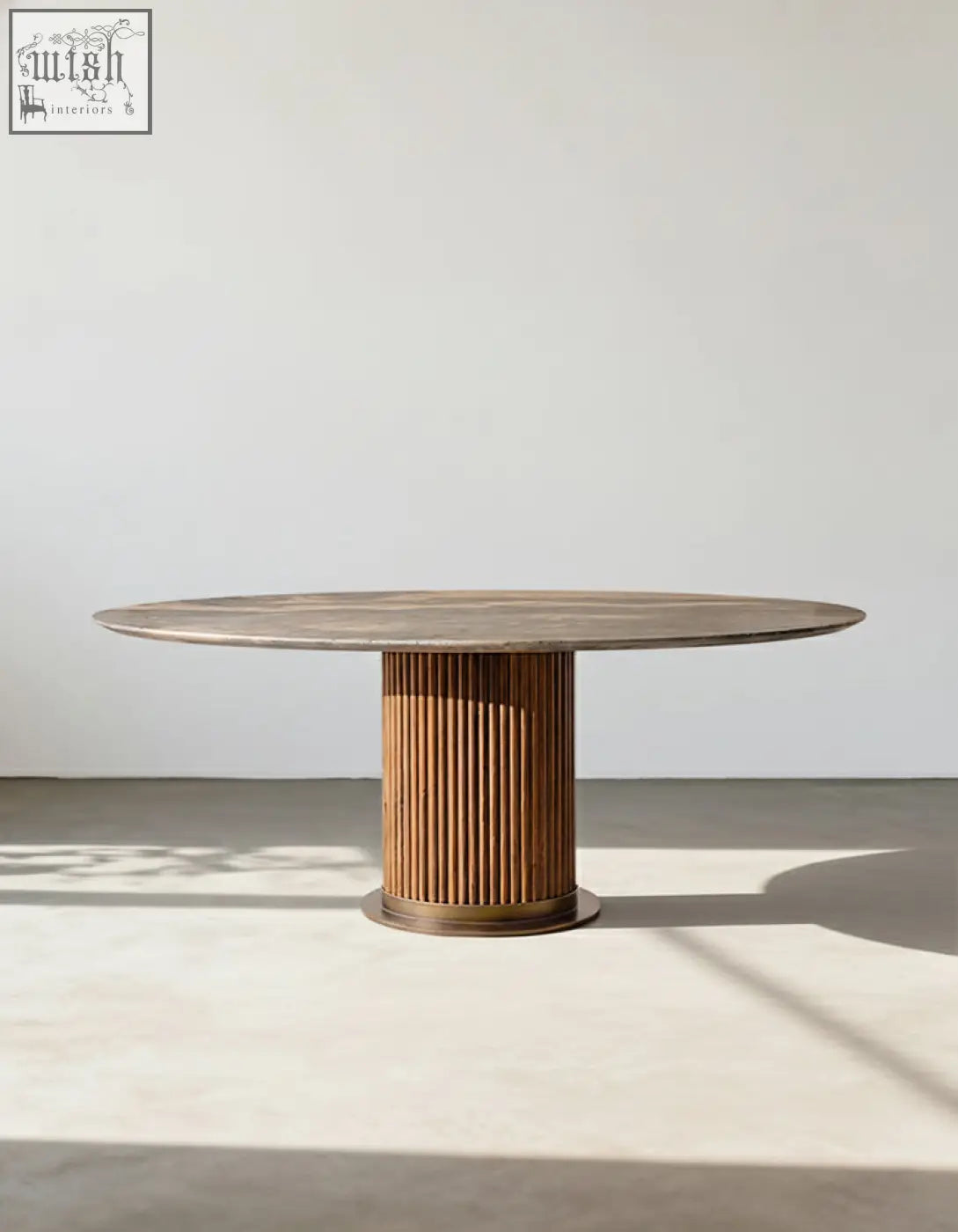 Round wooden dining table with fluted pedestal base and light brown top in murcell oval dining table style
