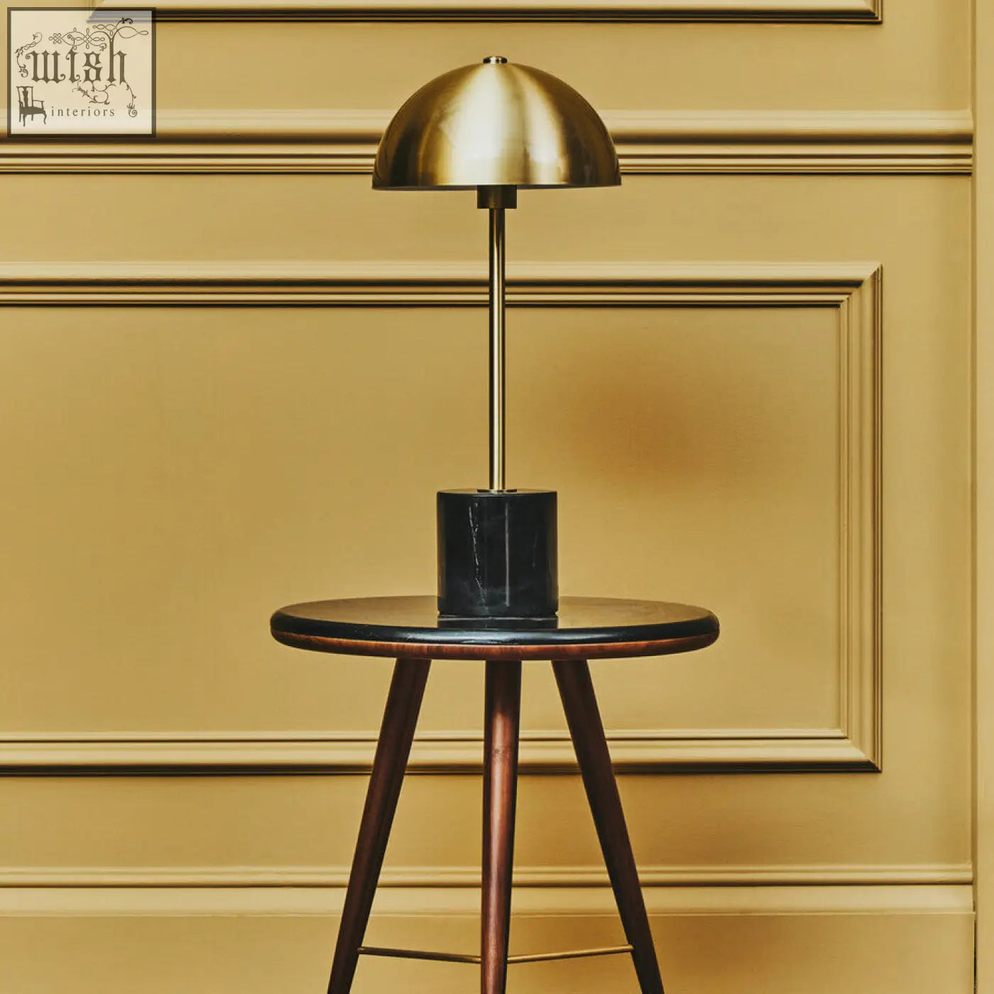 Murdoch brushed brass table lamp with a sleek brass dome and black marble base for modern decor
