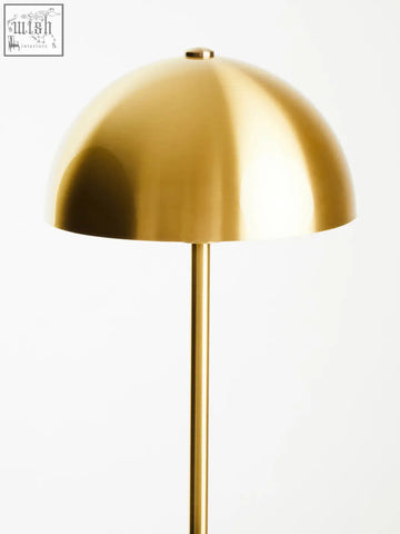 Murdoch brushed brass table lamp with sleek gold dome shade and black marble base for stylish lighting