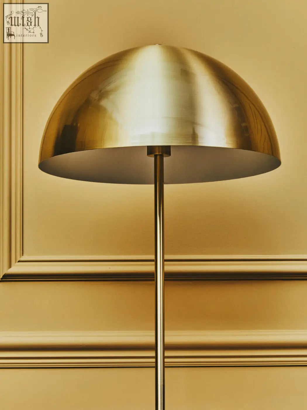 Murdoch brass table lamp with a sleek brushed gold dome and black marble base for stylish modern decor