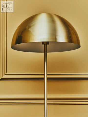Murdoch brass table lamp with a sleek brushed gold dome and black marble base for stylish modern decor