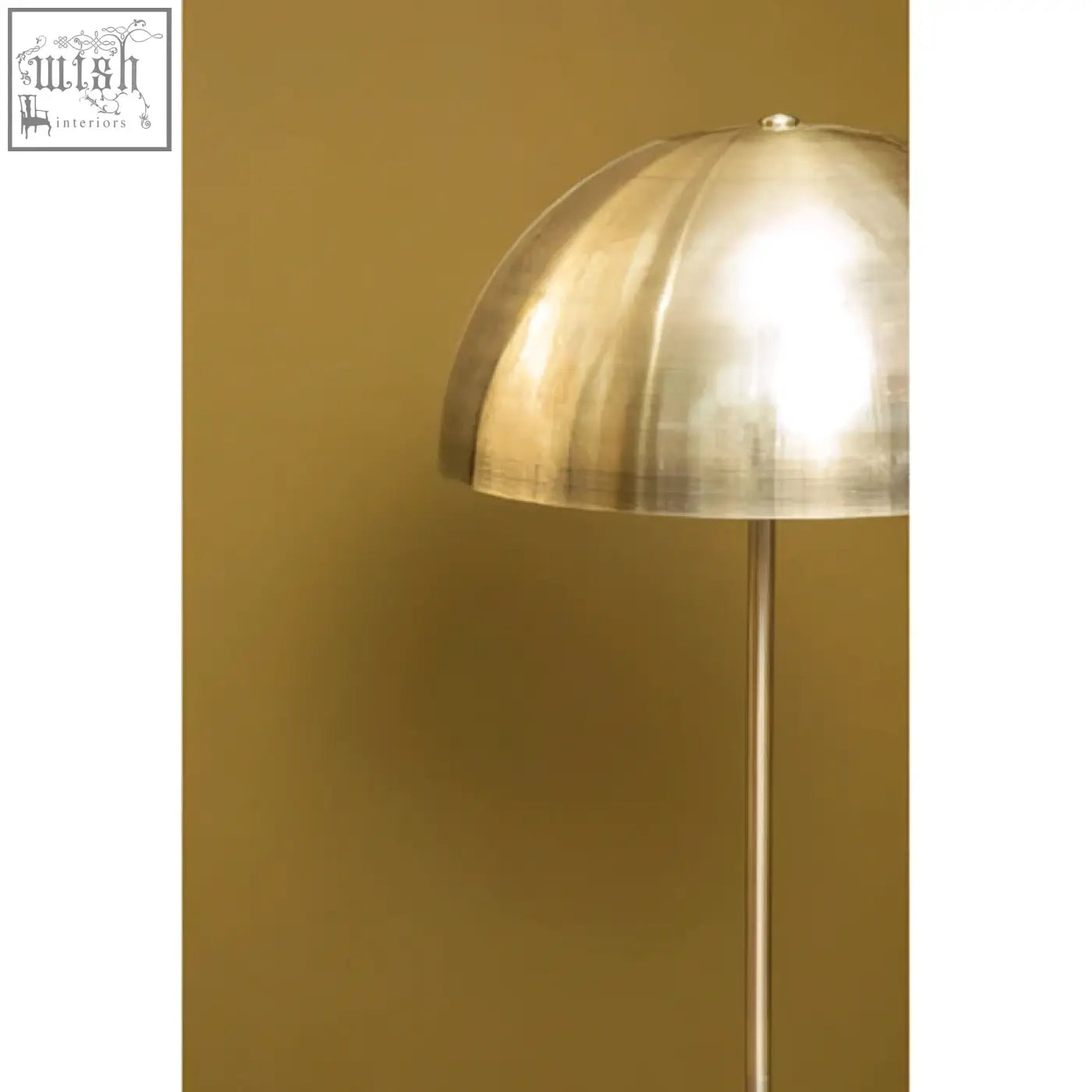 Murdoch floor lamp with brushed brass dome shade and marble base featuring a sleek segmented design
