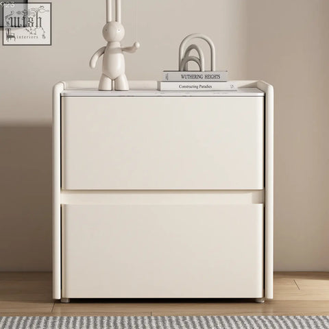 Cream solid wood mursi bedside table with two drawers featuring a minimalist modern design