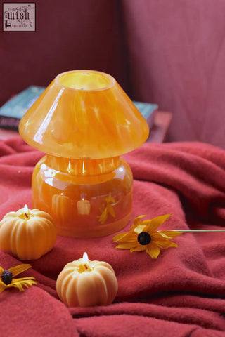 Extra large 500 g mushroom lamp candle with orange translucent glass shade and pumpkin etched base notes design