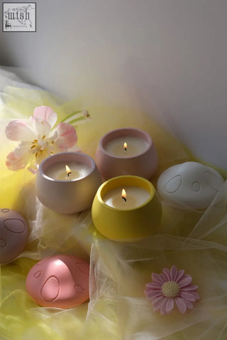 Pastel-colored handmade jar mushroom scented candle holders with ylang ylang and vanilla musk in smooth ceramic