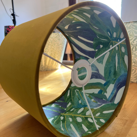 Mustard velvet double sided ceiling light shade with tropical green and blue leaf pattern inside