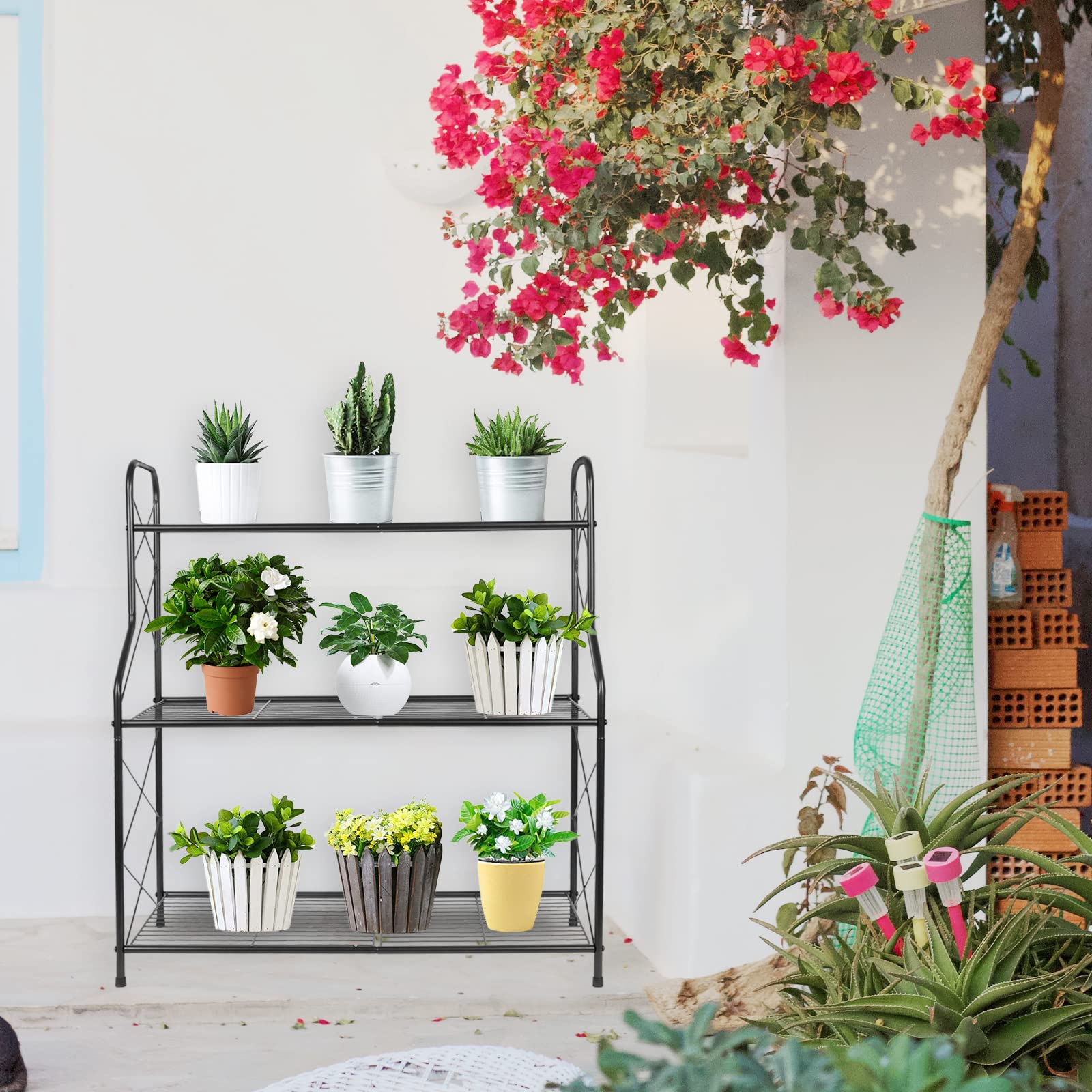 Black metal 3 tier plant stand with curved handles and diagonal support bars for indoor outdoor use