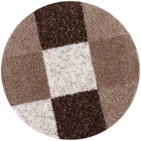 Circular myshaggy geometric brown rug with a shaggy texture and a pattern of brown, dark brown, and cream sections