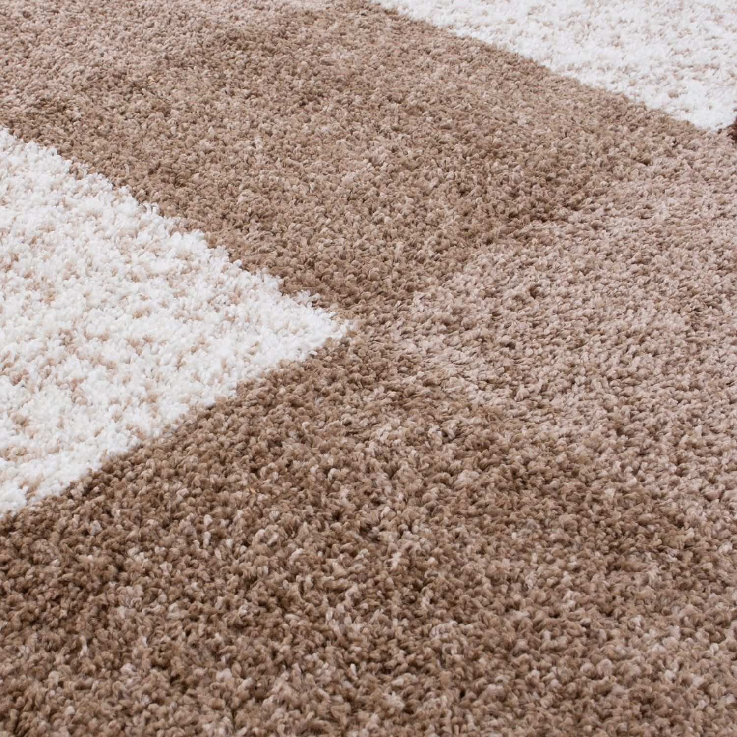 A plush high-pile brown rug with a beige and cream geometric pattern from myshaggy geometric brown collection