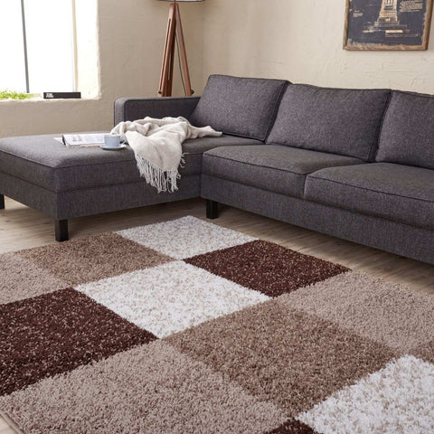 A plush shaggy myshaggy geometric brown rug with a soft texture and alternating brown and beige squares pattern