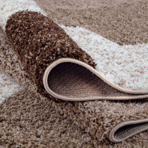 A plush myshaggy geometric brown rug with soft brown and cream shaggy texture perfect as a brown rug centerpiece