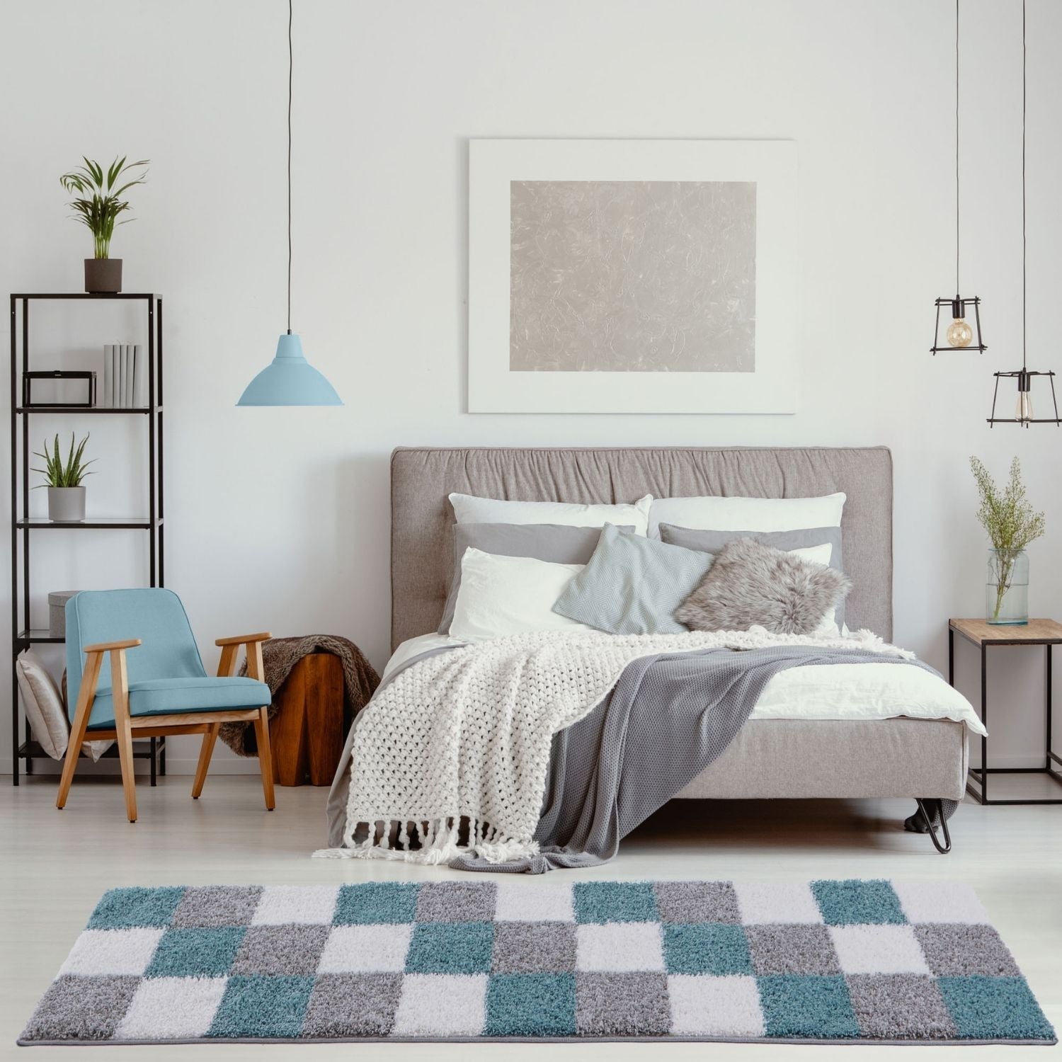 A plush rectangular Myshaggy geometric rug with a shaggy texture in duck egg blue and gray squares on white