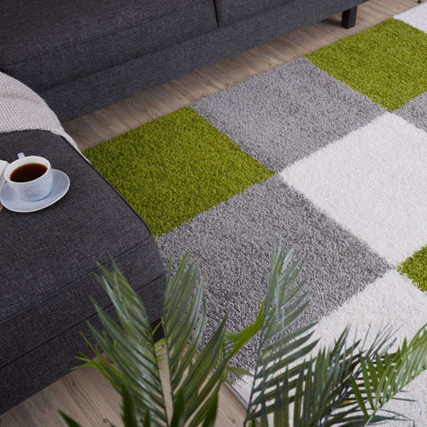 A myshaggy geometric green rug with plush shaggy squares in vibrant green soft gray and crisp white perfect for modern spaces