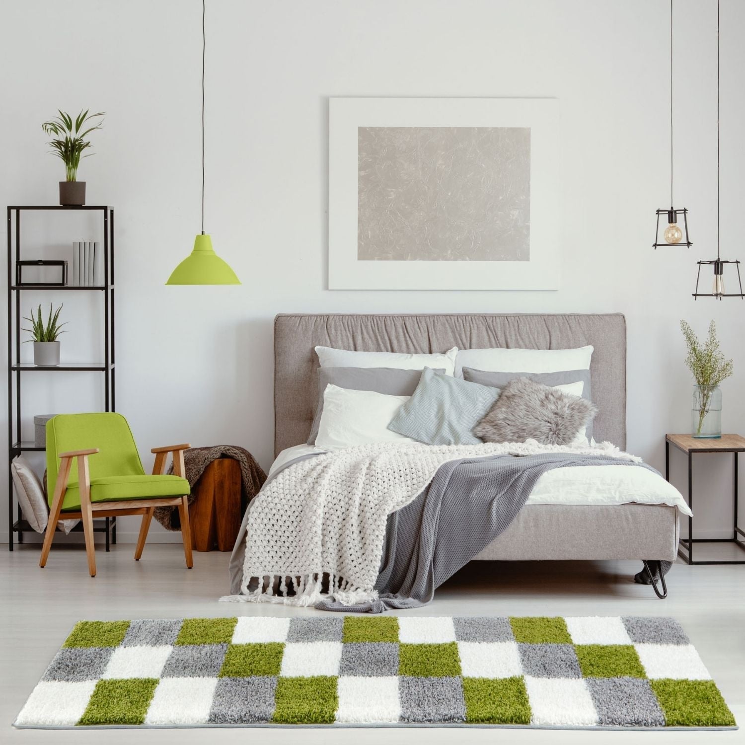 A plush myshaggy geometric green rug with a bold checkered pattern in shades of green gray and white