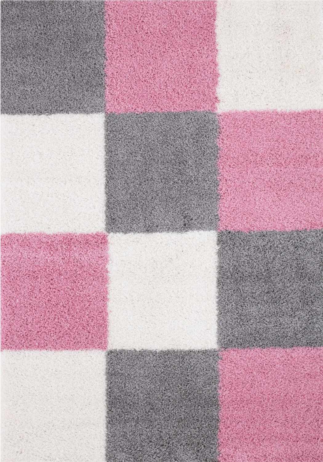 A plush myshaggy geometric pink rug with a modern checkered pattern in shades of pink gray and white