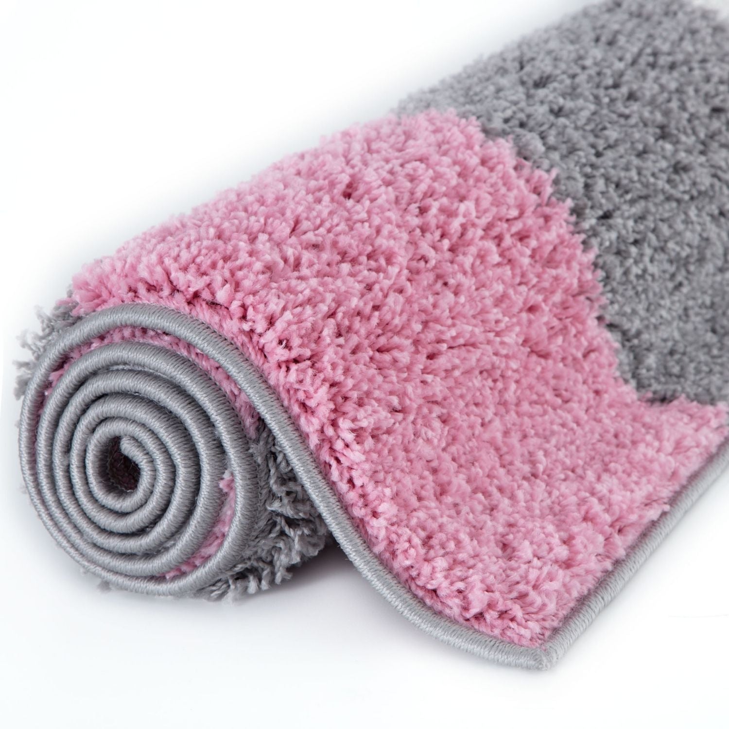 A plush myshaggy geometric pink rug with two-toned pink and gray shaggy texture and neatly finished edges
