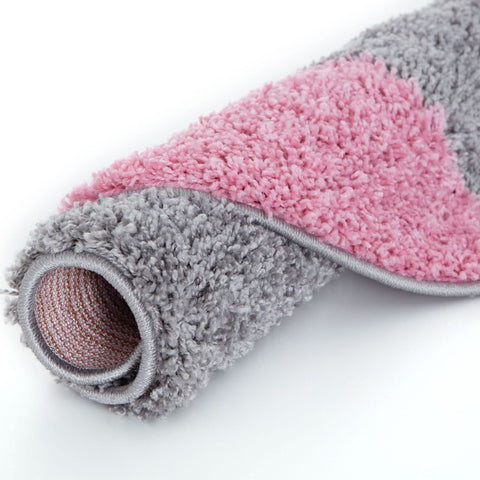 A plush myshaggy geometric pink rug with soft pink and gray shaggy texture perfect for cozy spaces