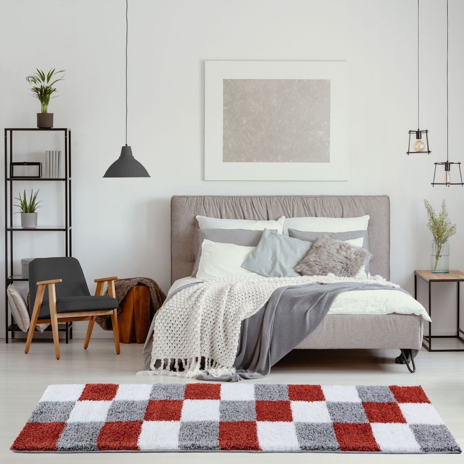 A plush myshaggy geometric terra rug with a bold red white and gray checkered pattern perfect for cozy spaces