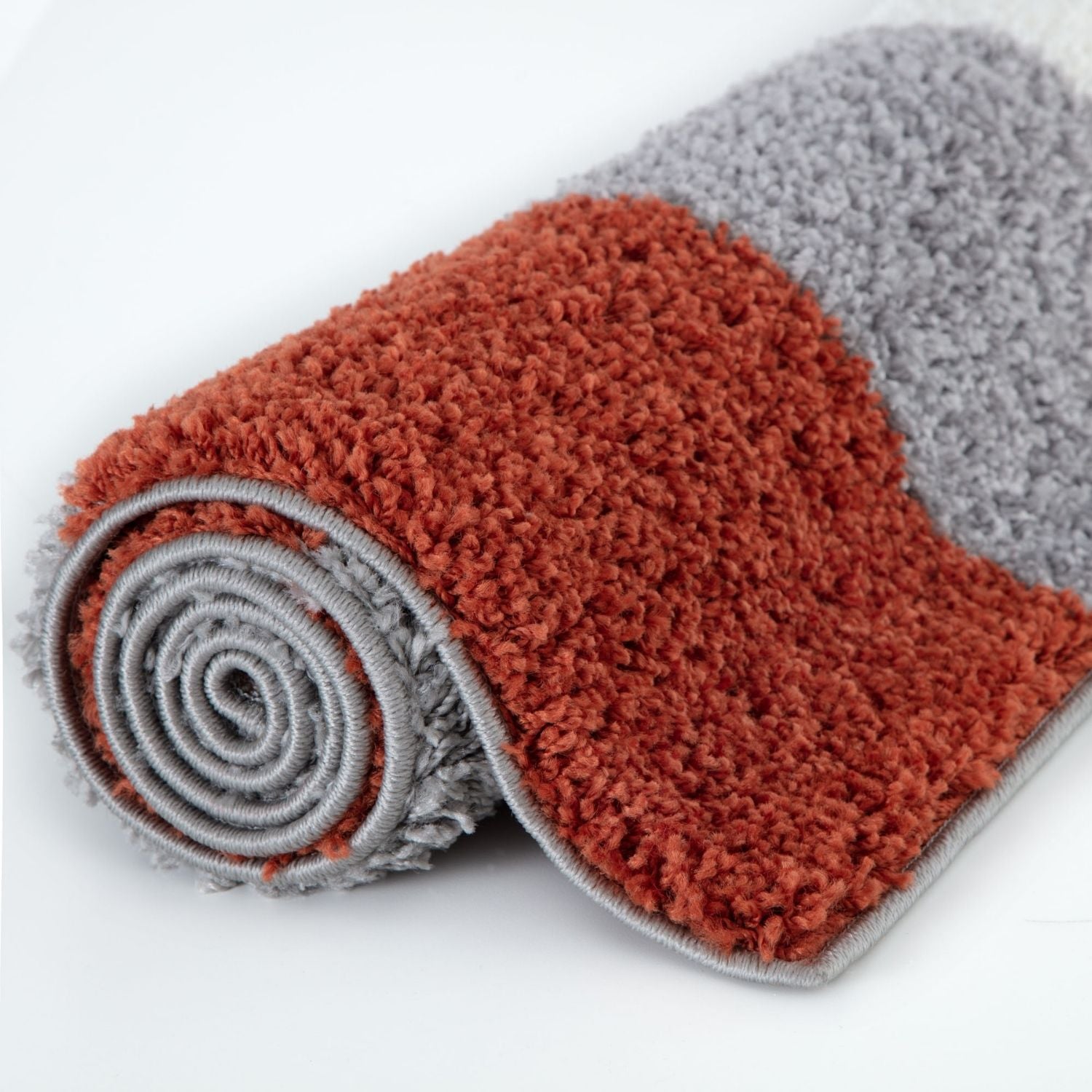 A plush myshaggy geometric terra rug with soft coral and gray shaggy texture for cozy home decor