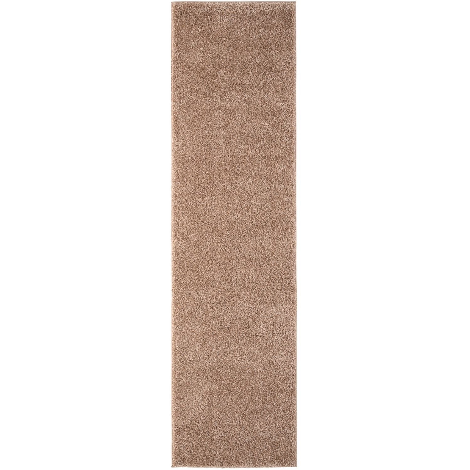 A plush taupe-colored shag rug with dense pile from myshaggy solid beige solid beige rug collection