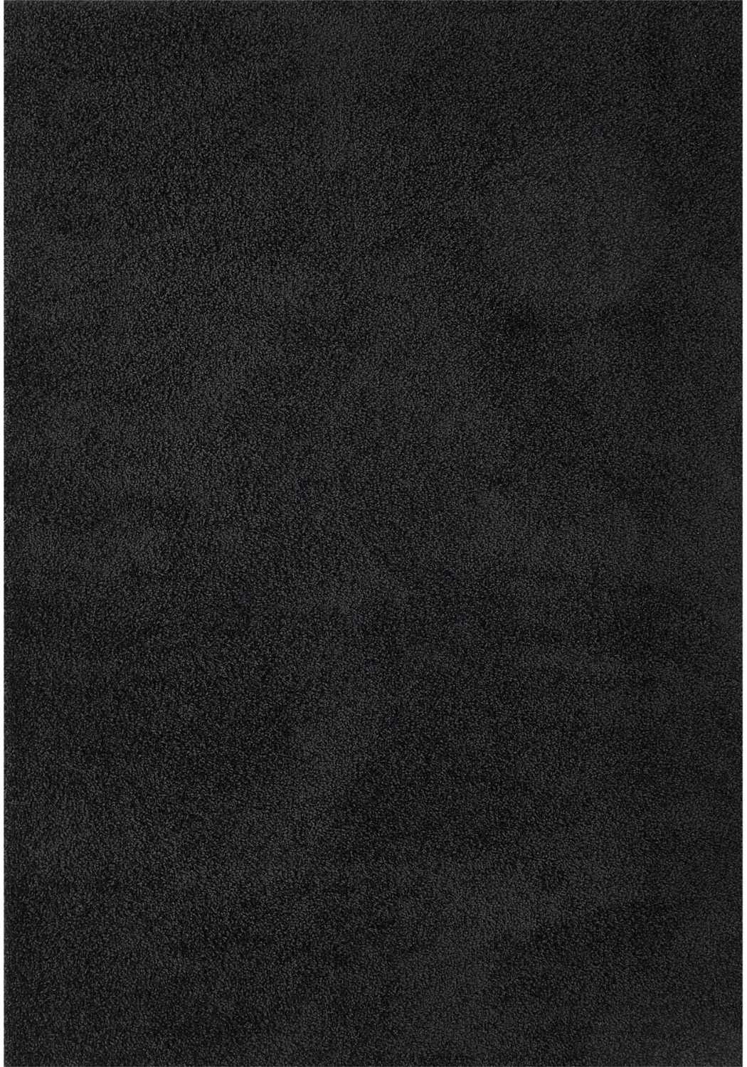 Black rug with soft textured surface from myshaggy solid black collection perfect as a plush solid black rug