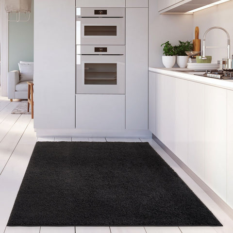 Black plush rectangular myshaggy solid black rug perfect as a cozy solid black rug for any room