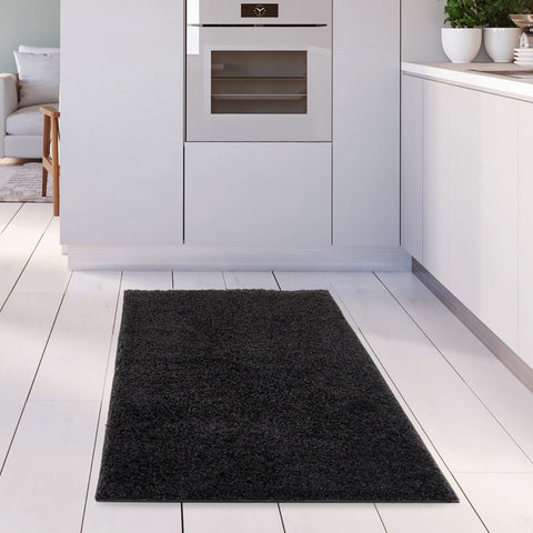 Black shaggy rectangular rug from myshaggy solid black collection perfect solid black rug for cozy spaces