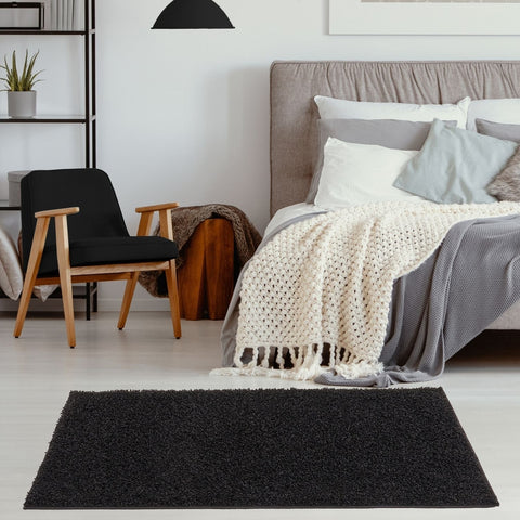 Black shaggy rectangular rug from myshaggy solid black collection perfect solid black rug for cozy spaces