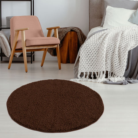 A plush round brown rug with soft shaggy texture perfect for cozy floors myshaggy solid brown rug