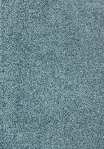 A plush teal shag rug with a soft textured surface in duck egg blue perfect for cozy rooms and decor