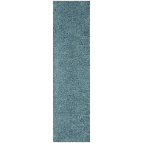 A plush solid duck egg blue runner rug with soft shaggy texture perfect for cozy home spaces