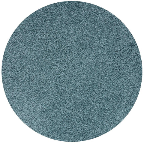 Circular duck egg blue rug with textured plush surface perfect for cozy living spaces