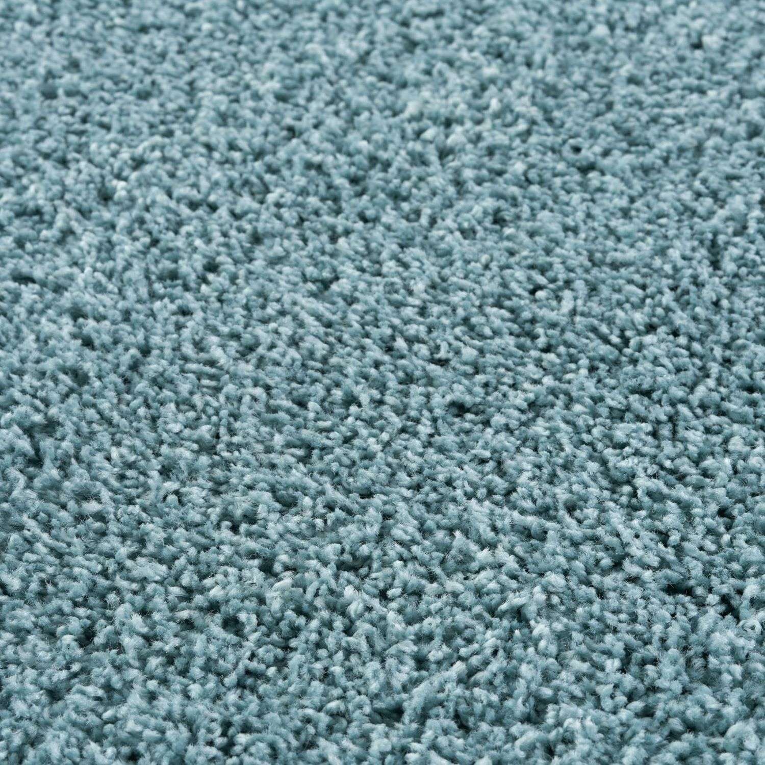 A plush light blue shaggy carpet showing the soft textured surface of the myshaggy solid duck egg blue rug