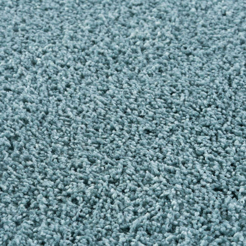 A plush light blue shaggy carpet showing the soft textured surface of the myshaggy solid duck egg blue rug