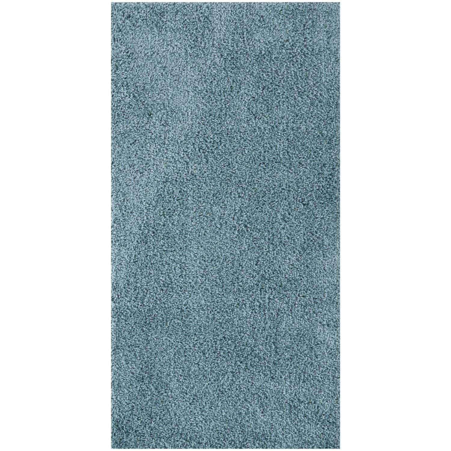 A plush textured teal duck egg blue rug with a soft shaggy surface perfect for cozy spaces